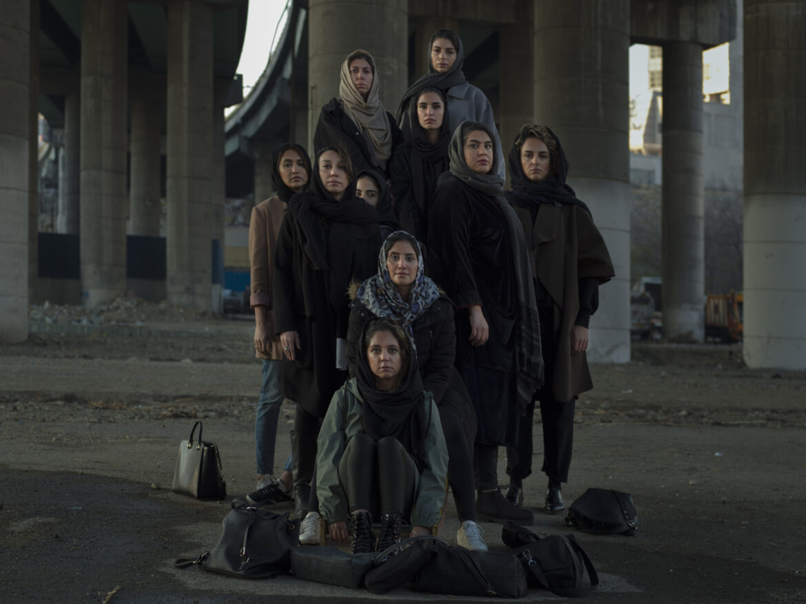 © Newsha Tavakolian And They Laughed At Me. A group of young women in Tehran resembling a mountain. 2020